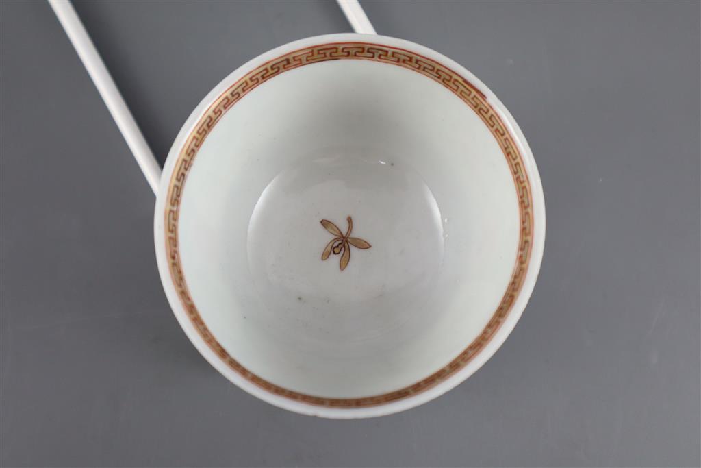 A Chinese famille rose hawk tea bowl and saucer, Yongzheng period, saucer 11.5cm diameter